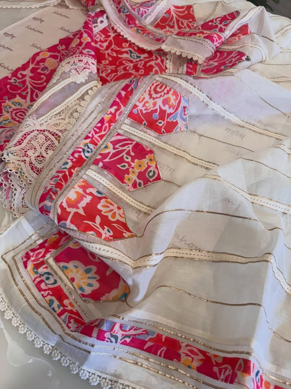 Desginer linen kurta and cotton mul dupatta combined with a plain lower.