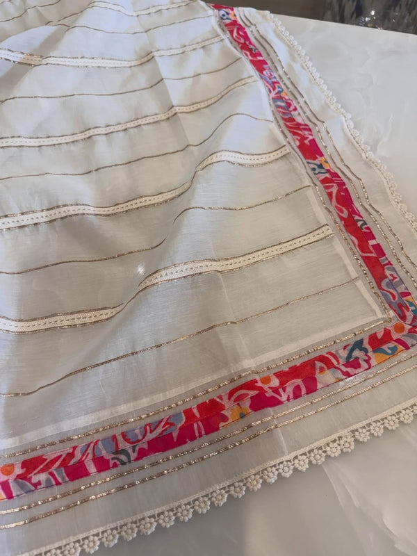 Desginer linen kurta and cotton mul dupatta combined with a plain lower.