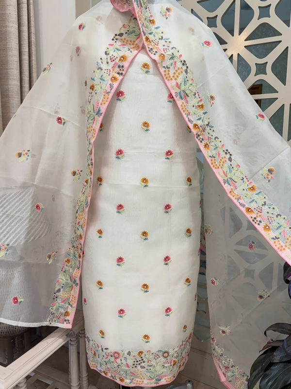 Pure organza silk thread work embroidered kurta and dupatta combined with a plain lower.