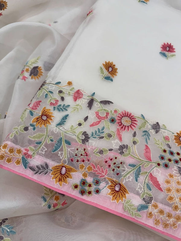 Pure organza silk thread work embroidered kurta and dupatta combined with a plain lower.