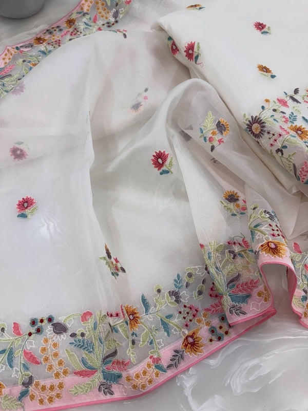 Pure organza silk thread work embroidered kurta and dupatta combined with a plain lower.