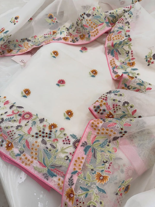 Pure organza silk thread work embroidered kurta and dupatta combined with a plain lower.