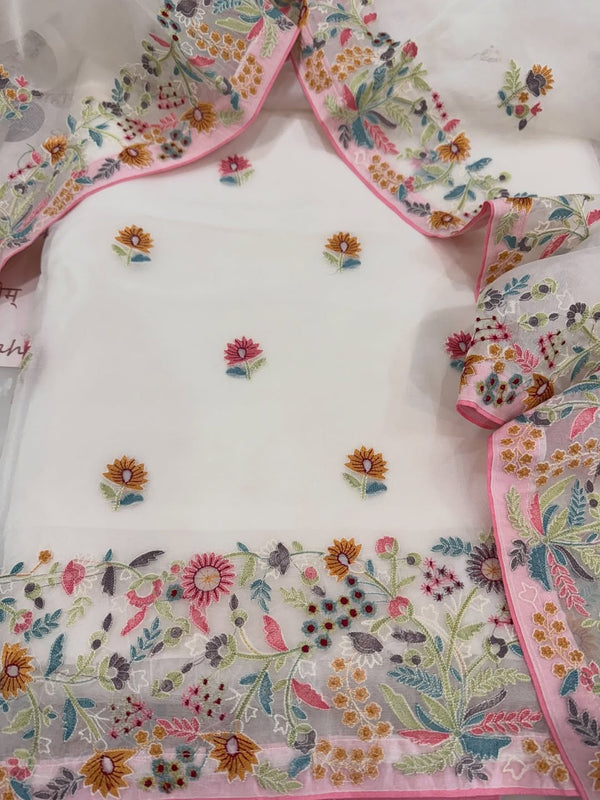 Pure organza silk thread work embroidered kurta and dupatta combined with a plain lower.