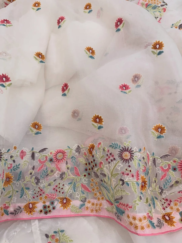 Pure organza silk thread work embroidered kurta and dupatta combined with a plain lower.