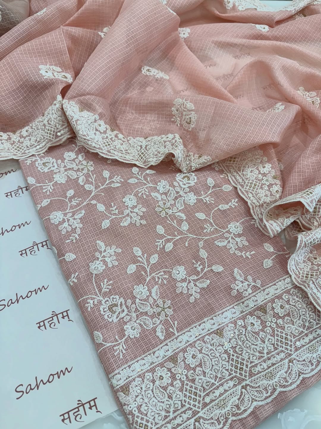 kota doria thread work embroidered kurta and dupatta combined with a plain lower.