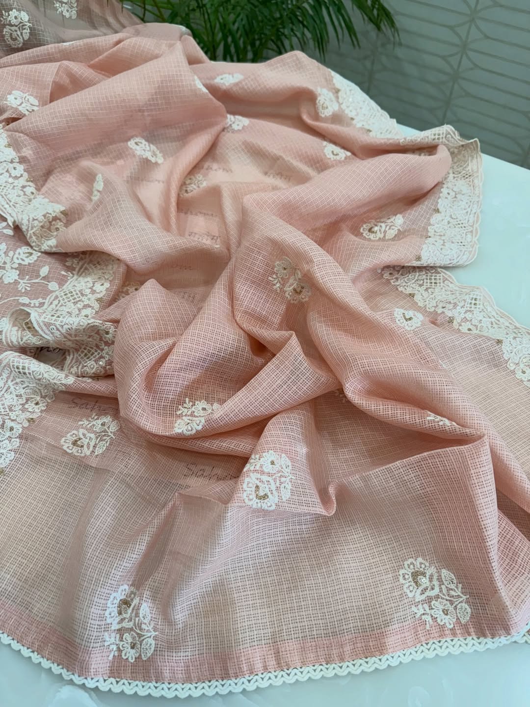 kota doria thread work embroidered kurta and dupatta combined with a plain lower.